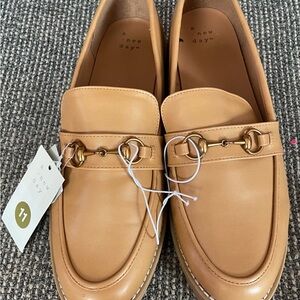 Never been worn size 11 tan loafers